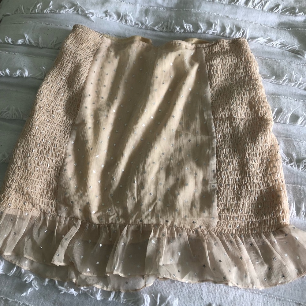 Smocked tan star mini skirt